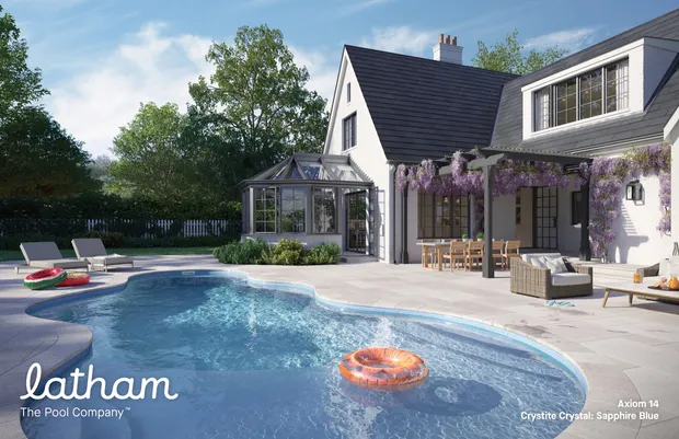 Fiberglass pool with tanning ledge on a sunny afternoon