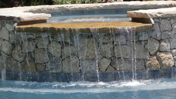 Luxurious pool with decorative floor pattern and clean design