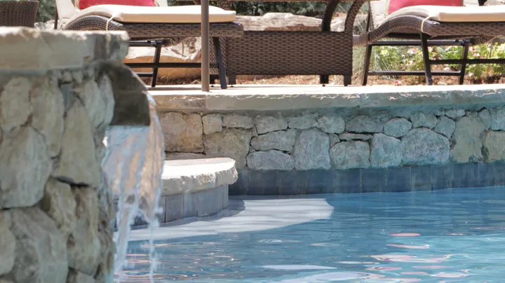 Stone waterfall element with clean lines and professional construction